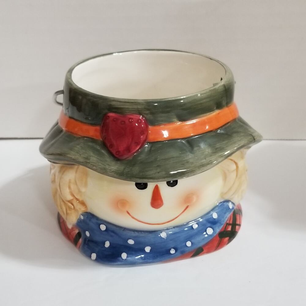 old time pottery farmer boy snowman candle holder  handle
